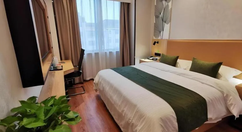 Bed in GreenTree Inn Express Fuzhou Le'an County Government Sijiu Square