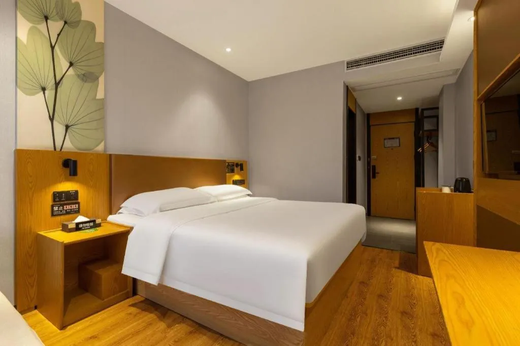 Bed in GreenTree Inn Express Fuzhou Le'an County Government Sijiu Square