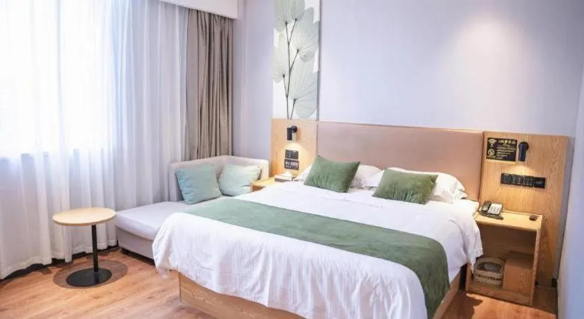 Bed in GreenTree Inn Express Fuzhou Le'an County Government Sijiu Square