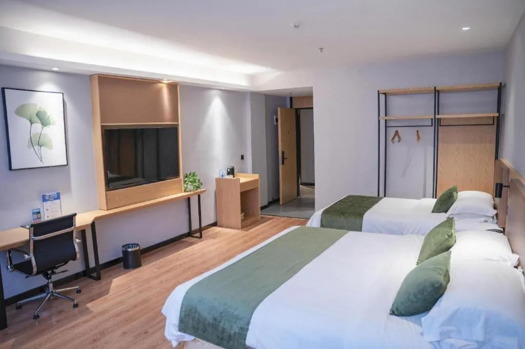 Bed in GreenTree Inn Express Fuzhou Le'an County Government Sijiu Square
