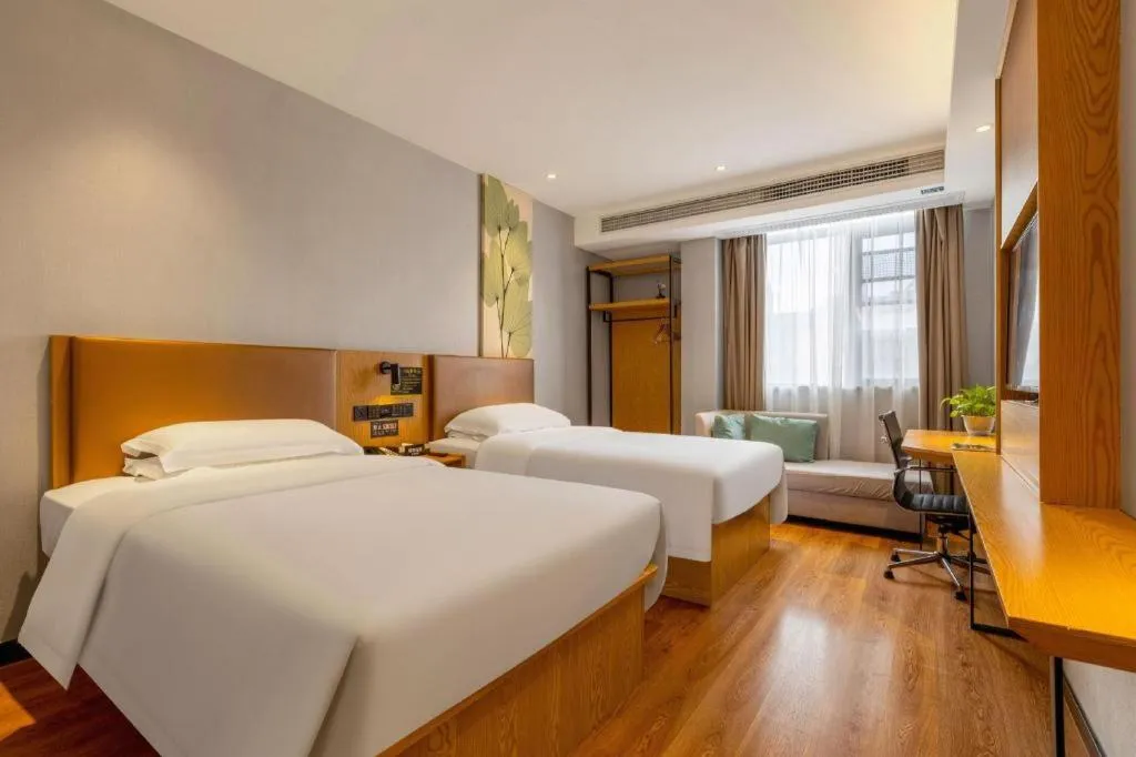 Bed in GreenTree Inn Express Fuzhou Le'an County Government Sijiu Square