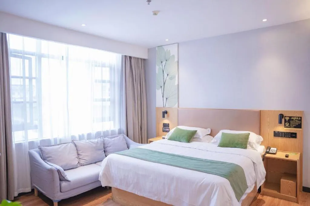 Bed in GreenTree Inn Express Fuzhou Le'an County Government Sijiu Square