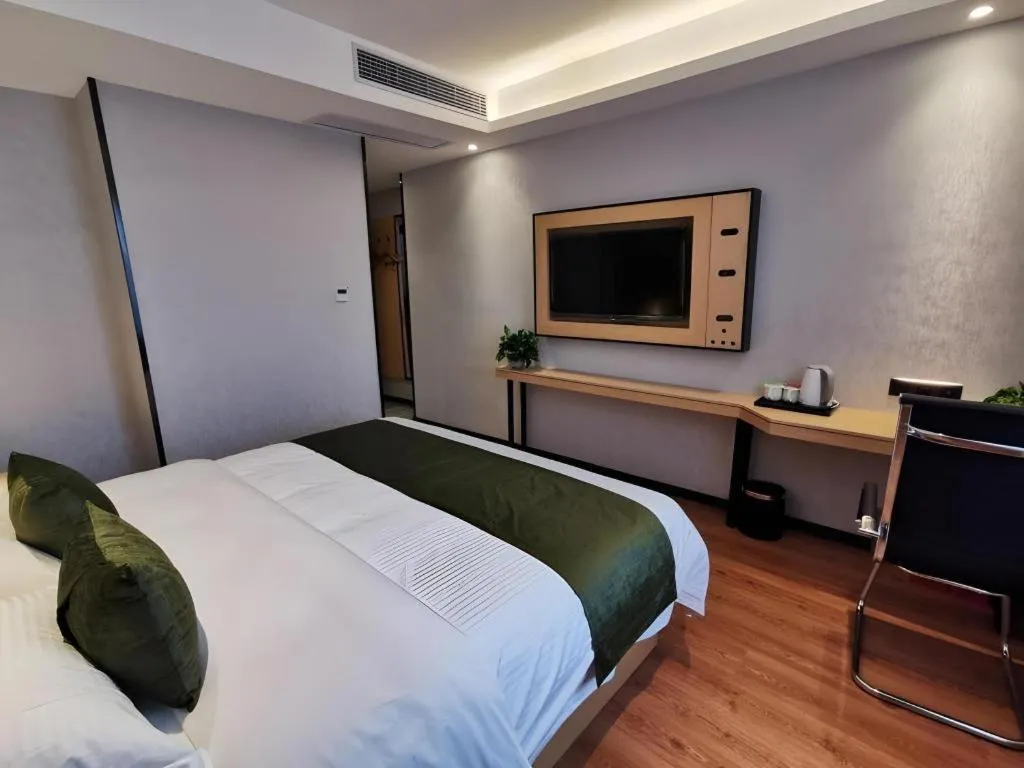 Bed in GreenTree Inn Express Fuzhou Le'an County Government Sijiu Square