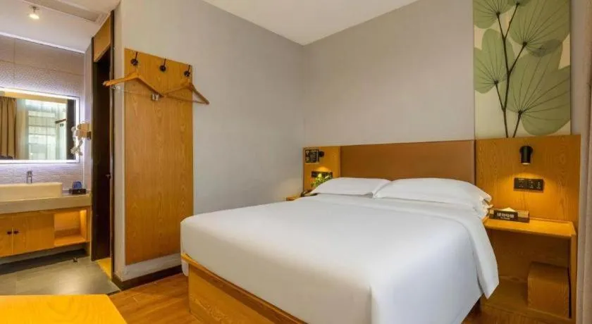Bed in GreenTree Inn Express Fuzhou Le'an County Government Sijiu Square