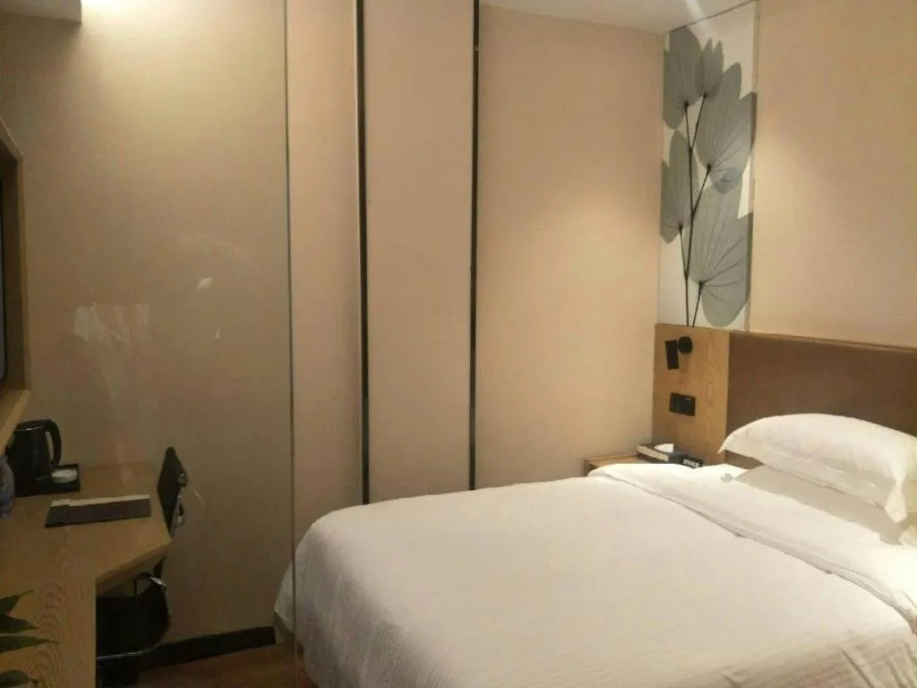 Bed in GreenTree Inn Express Fuzhou Le'an County Government Sijiu Square