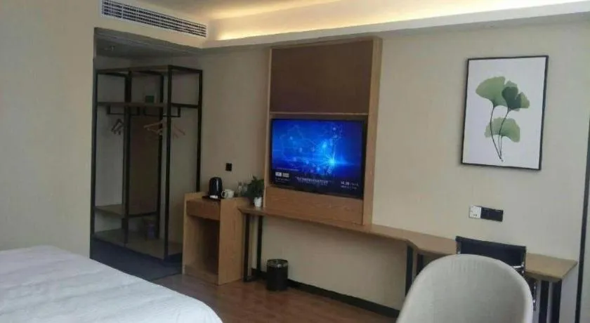 Bed in GreenTree Inn Express Fuzhou Le'an County Government Sijiu Square