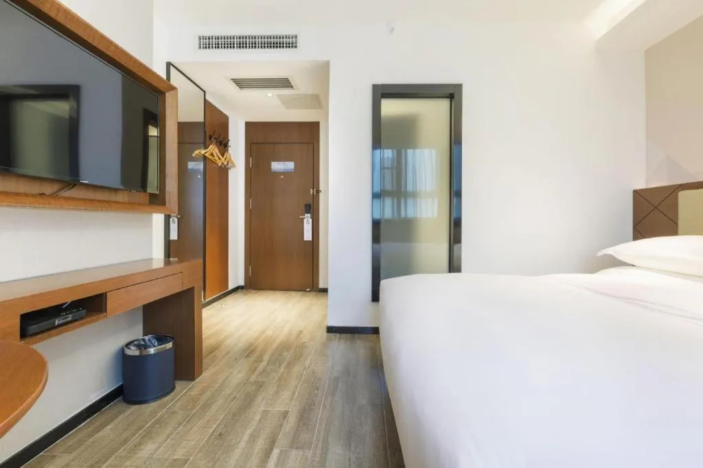 Bed in Borrman Hotel Guangzhou Southern Hospital Meihuayuan Metro Station