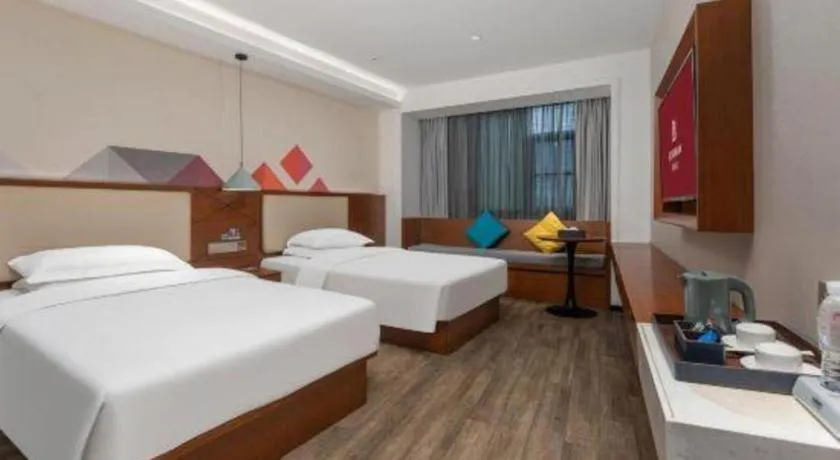 Bed in Borrman Hotel Guangzhou Southern Hospital Meihuayuan Metro Station