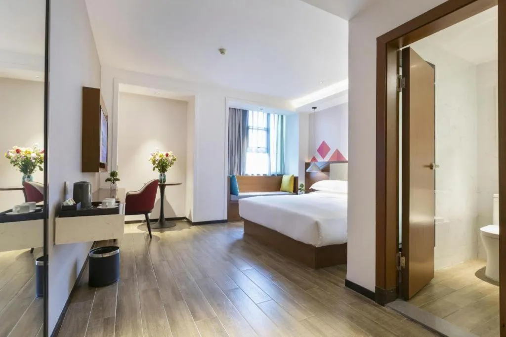 Bed in Borrman Hotel Guangzhou Southern Hospital Meihuayuan Metro Station