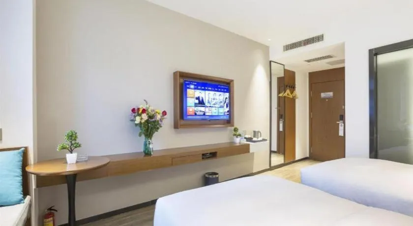 Bed in Borrman Hotel Guangzhou Southern Hospital Meihuayuan Metro Station