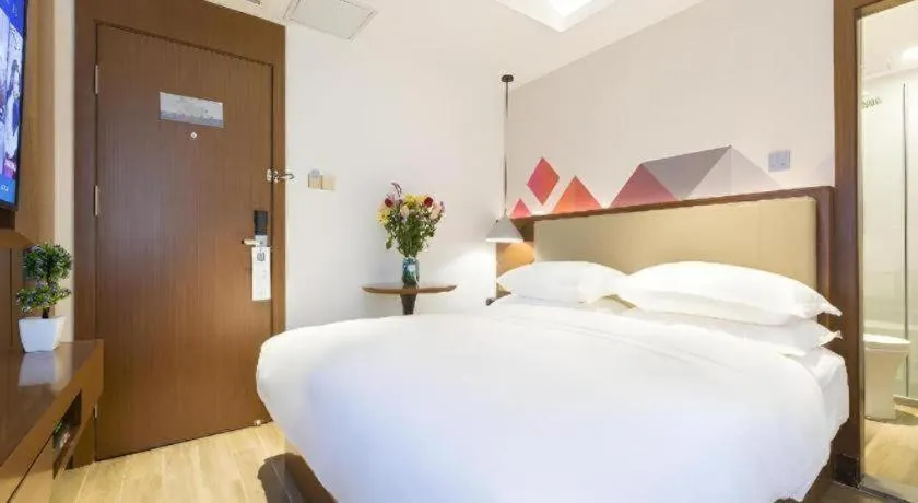 Bed in Borrman Hotel Guangzhou Southern Hospital Meihuayuan Metro Station