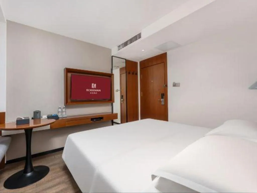 Bed in Borrman Hotel Guangzhou Southern Hospital Meihuayuan Metro Station