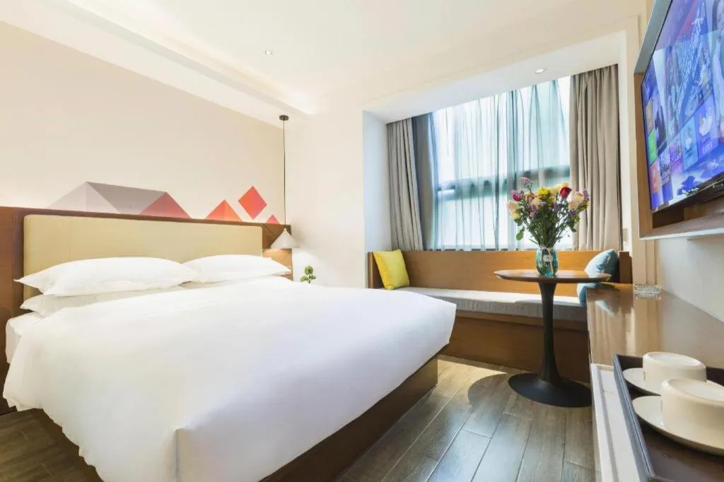 Bed in Borrman Hotel Guangzhou Southern Hospital Meihuayuan Metro Station