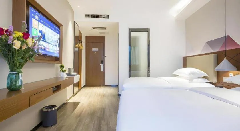 Bed in Borrman Hotel Guangzhou Southern Hospital Meihuayuan Metro Station