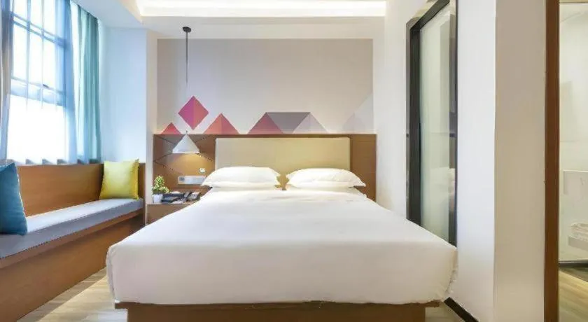 Bed in Borrman Hotel Guangzhou Southern Hospital Meihuayuan Metro Station