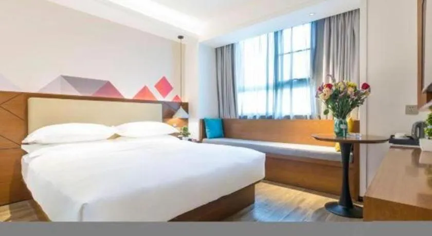 Bed in Borrman Hotel Guangzhou Southern Hospital Meihuayuan Metro Station