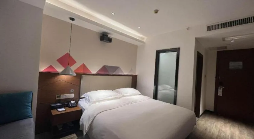 Bed in Borrman Hotel Guangzhou Southern Hospital Meihuayuan Metro Station