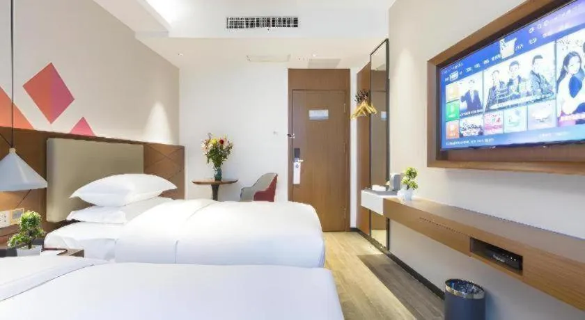 Bed in Borrman Hotel Guangzhou Southern Hospital Meihuayuan Metro Station