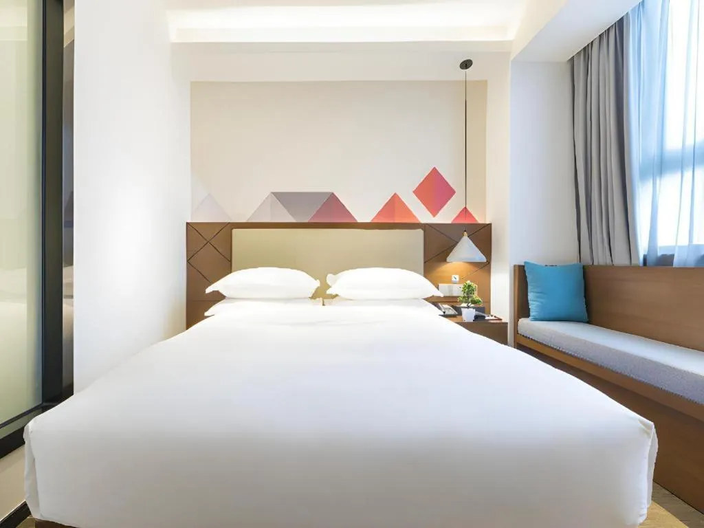 Bed in Borrman Hotel Guangzhou Southern Hospital Meihuayuan Metro Station