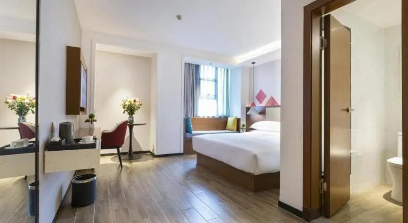 Bed in Borrman Hotel Guangzhou Southern Hospital Meihuayuan Metro Station