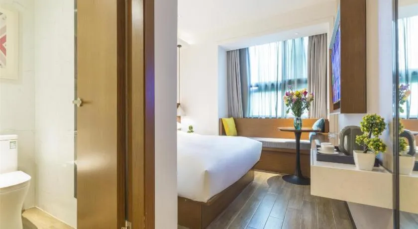 Bed in Borrman Hotel Guangzhou Southern Hospital Meihuayuan Metro Station