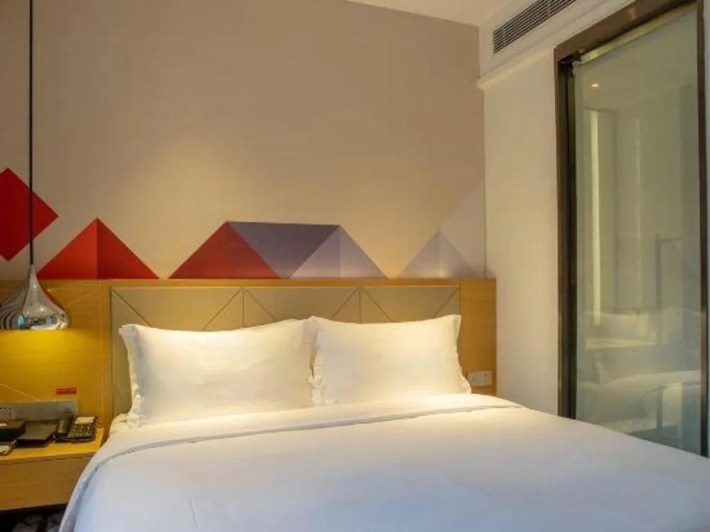 Bed in Borrman Hotel Guangzhou Southern Hospital Meihuayuan Metro Station