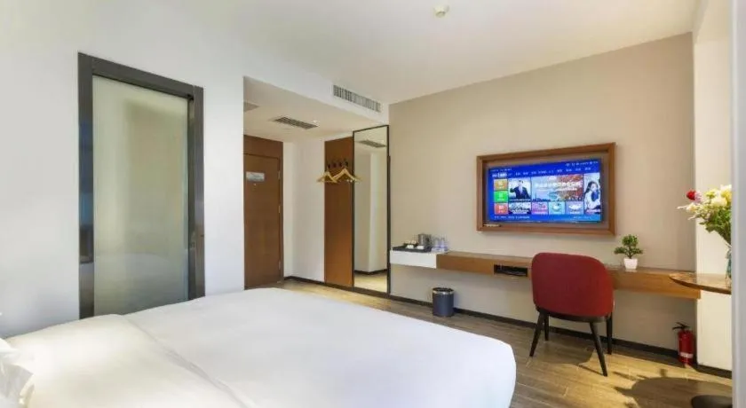 Bed in Borrman Hotel Guangzhou Southern Hospital Meihuayuan Metro Station