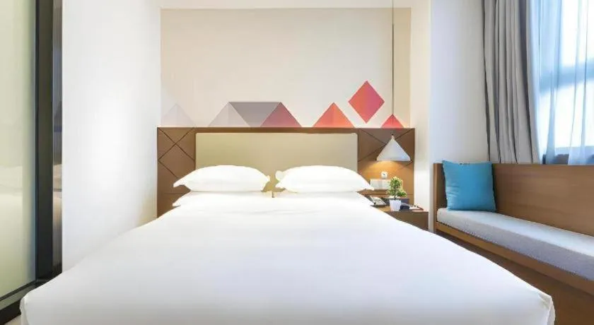 Bed in Borrman Hotel Guangzhou Southern Hospital Meihuayuan Metro Station