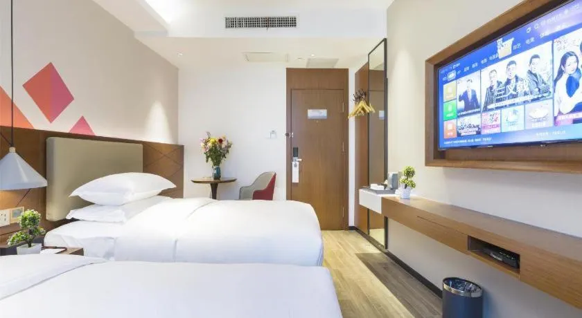 Bed in Borrman Hotel Guangzhou Southern Hospital Meihuayuan Metro Station