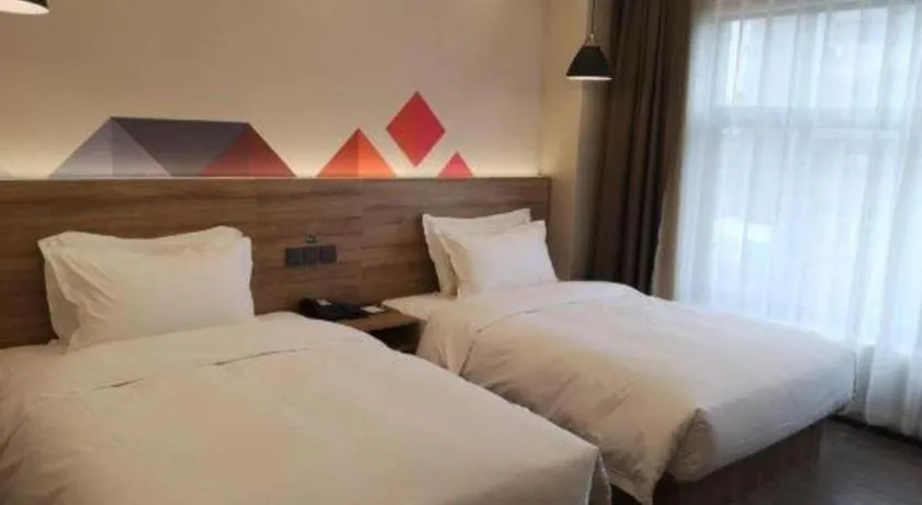 Bed in Borrman Hotel Guangzhou Southern Hospital Meihuayuan Metro Station