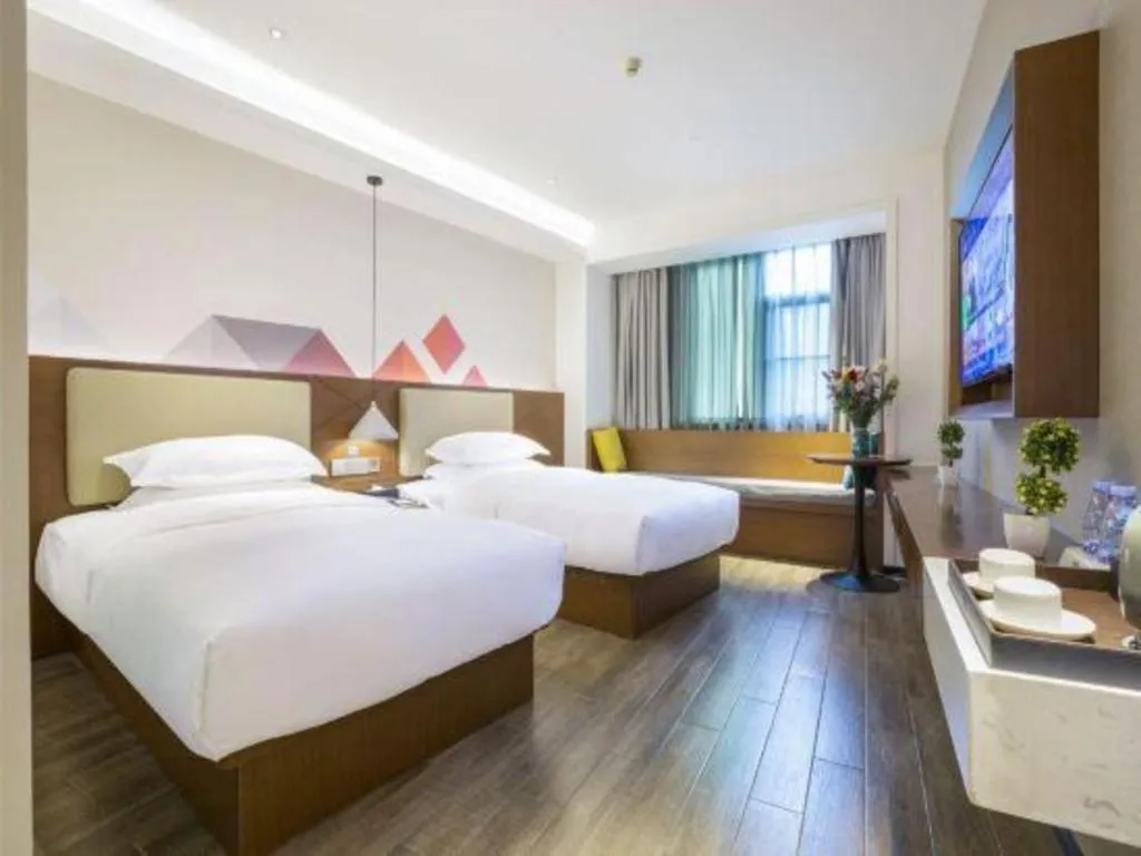 Bed in Borrman Hotel Guangzhou Southern Hospital Meihuayuan Metro Station