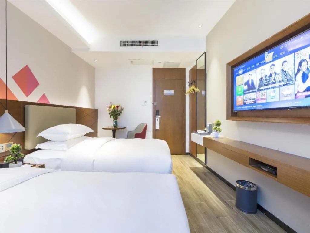 Bed in Borrman Hotel Guangzhou Southern Hospital Meihuayuan Metro Station