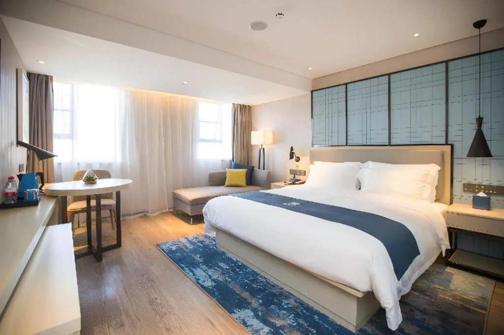 Bed in Echarm Hotel Shenzhen World Exhibition and Convention Center