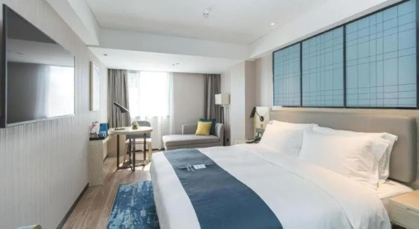 Bed in Echarm Hotel Shenzhen World Exhibition and Convention Center