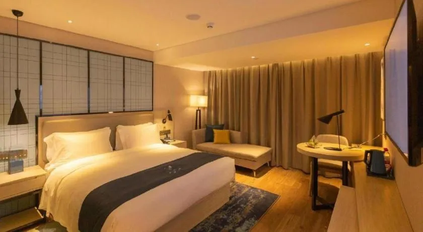 Bed in Echarm Hotel Shenzhen World Exhibition and Convention Center