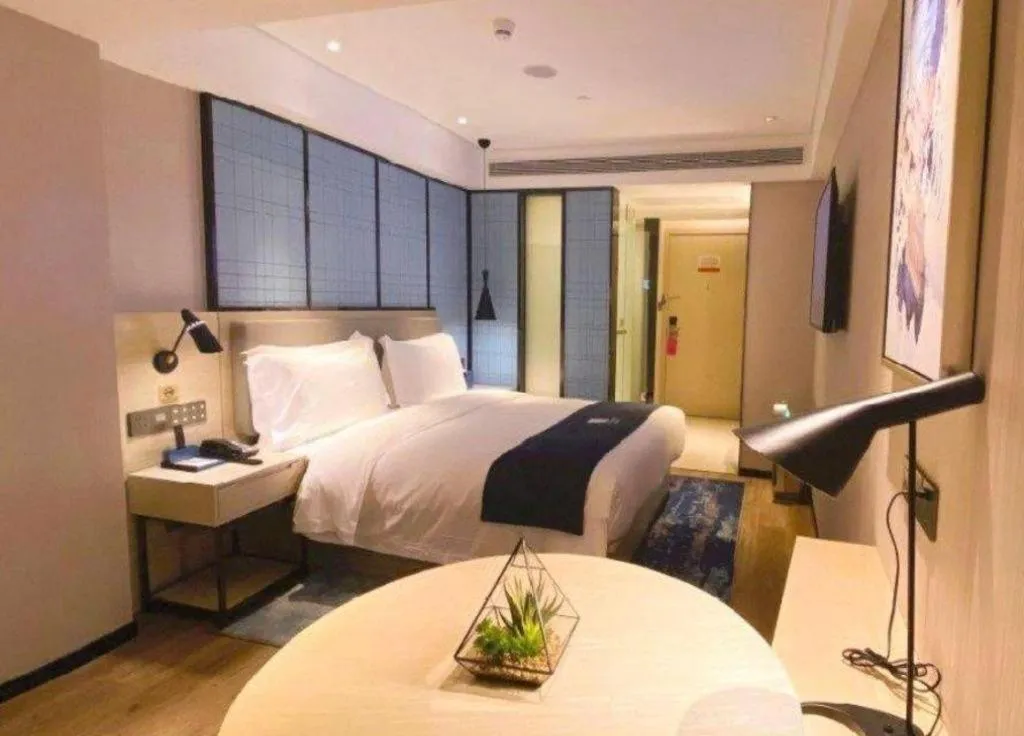 Bed in Echarm Hotel Shenzhen World Exhibition and Convention Center