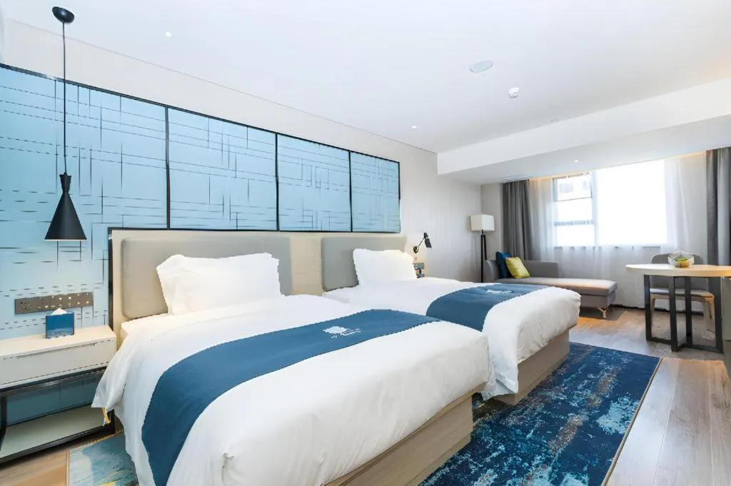 Bed in Echarm Hotel Shenzhen World Exhibition and Convention Center