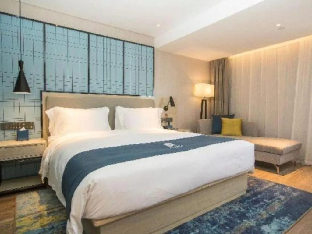 Bed in Echarm Hotel Shenzhen World Exhibition and Convention Center