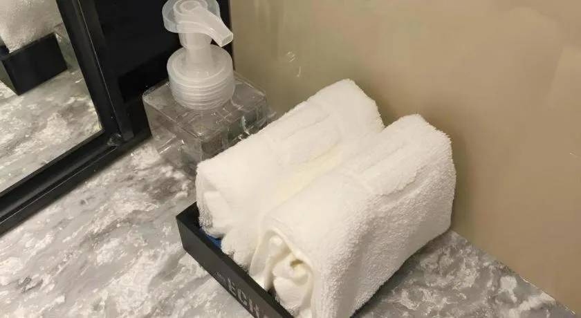 Bed in Echarm Hotel Shenzhen World Exhibition and Convention Center