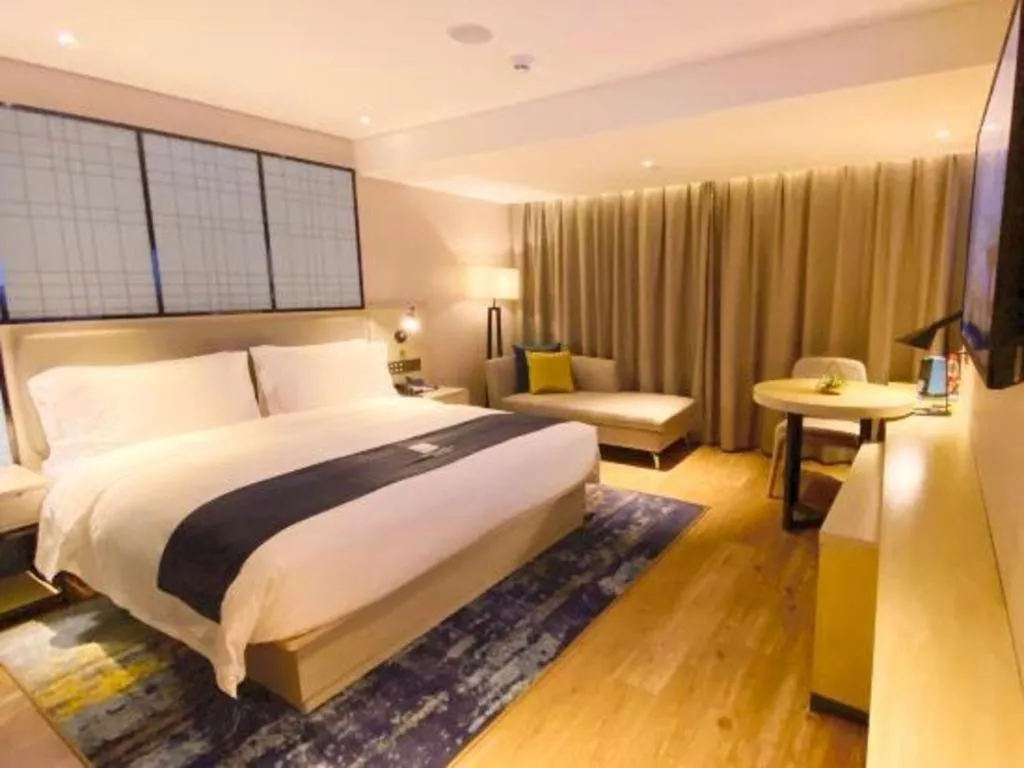 Bed in Echarm Hotel Shenzhen World Exhibition and Convention Center