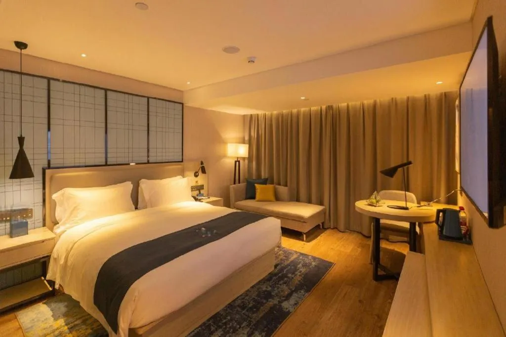 Bed in Echarm Hotel Shenzhen World Exhibition and Convention Center