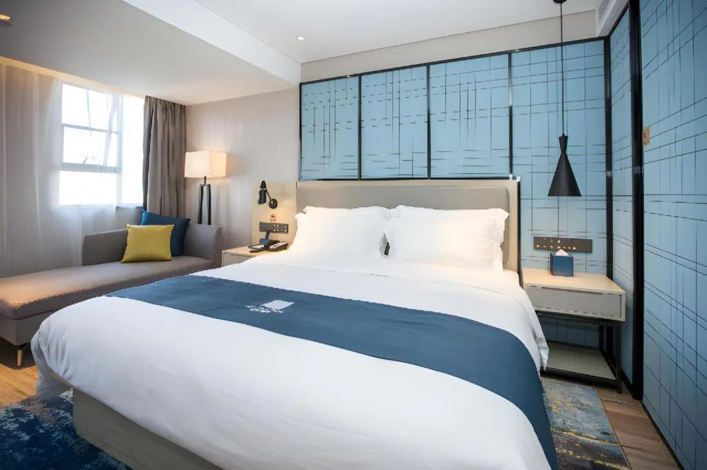 Bed in Echarm Hotel Shenzhen World Exhibition and Convention Center