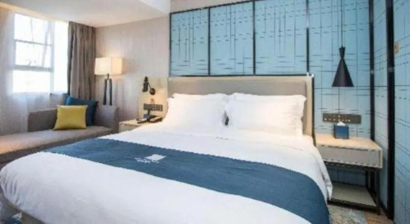 Bed in Echarm Hotel Shenzhen World Exhibition and Convention Center