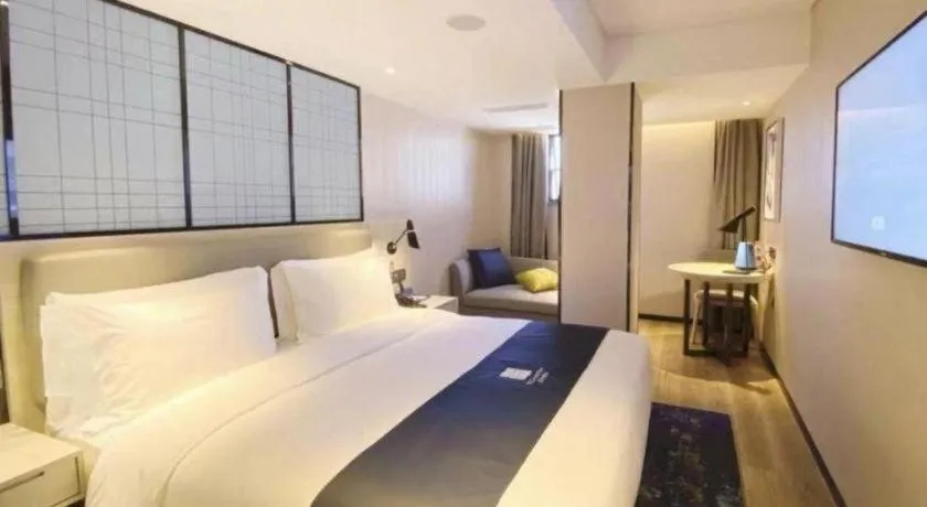 Bed in Echarm Hotel Shenzhen World Exhibition and Convention Center