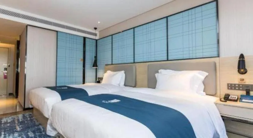 Bed in Echarm Hotel Shenzhen World Exhibition and Convention Center