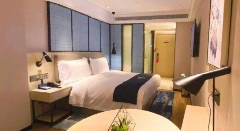 Bed in Echarm Hotel Shenzhen World Exhibition and Convention Center