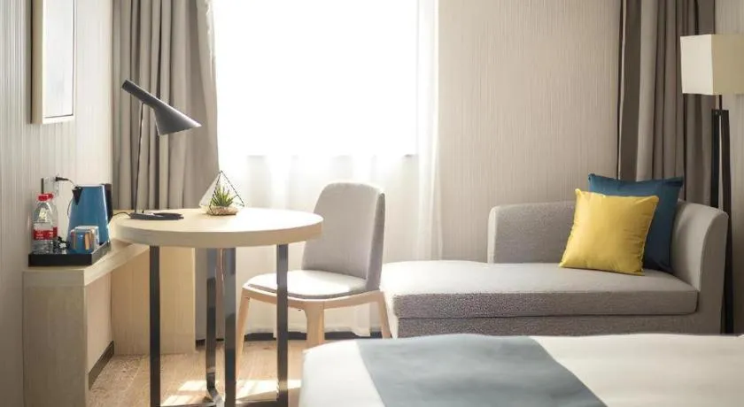 Bed in Echarm Hotel Shenzhen World Exhibition and Convention Center