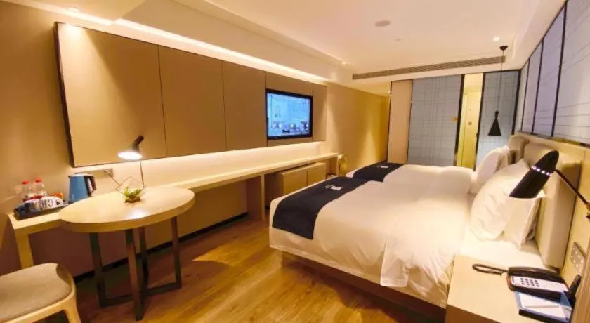 Bed in Echarm Hotel Shenzhen World Exhibition and Convention Center