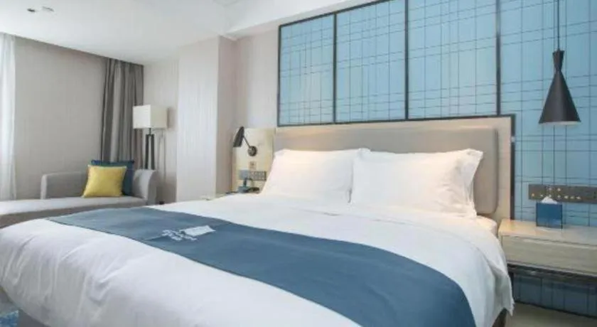 Bed in Echarm Hotel Shenzhen World Exhibition and Convention Center