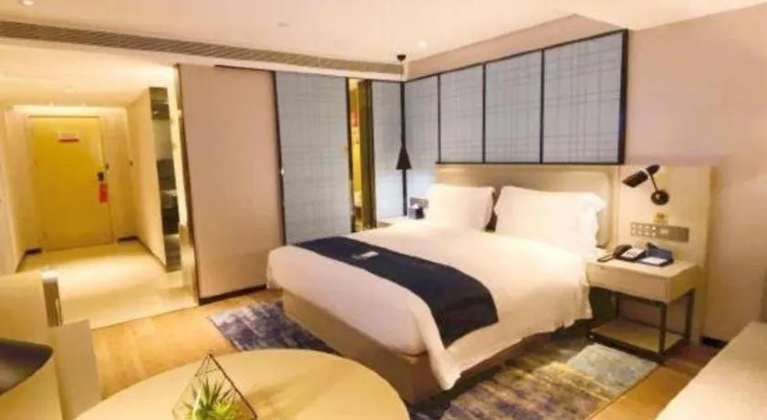 Bed in Echarm Hotel Shenzhen World Exhibition and Convention Center